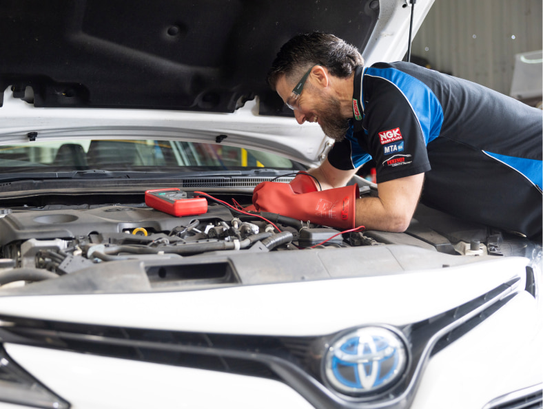 Chris testing a car battery